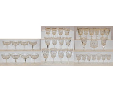 A part suite of Waterford crystal to include twelve red wine glasses, eight white wine glasses, eight champagne saucers, and 