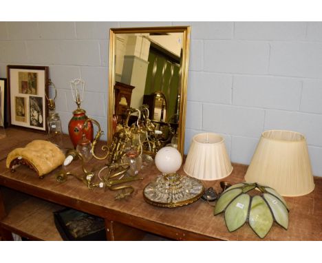 A brass four branch chandelier of ornithological form with cut glass shades, together with a pair of brass wall sconces, two 