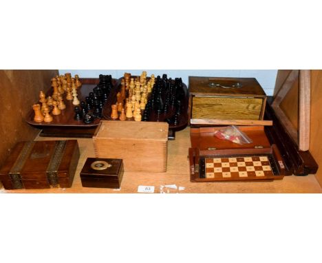 A quantity of gaming counters and related items including wooden chess pieces, a travelling chess set, cased mahjong set, Vic