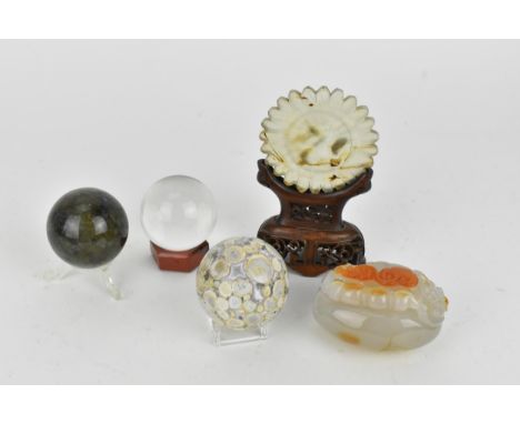 A Chinese carved agate decorative piece modelled with a dragon and scroll to the top and leaf detail to underside, together w