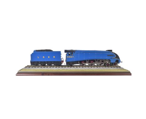 A kit built O gauge model railway trainset locomotive engine. The loco being a 4-6-2 LNER ' Wild Swan ' No. 4467 with tender.