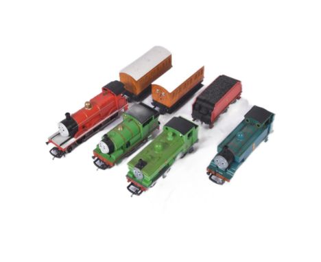 A collection of Hornby made Thomas The Tank Engine OO gauge model railway trainset locomotive engines and x2 carriages (Annie