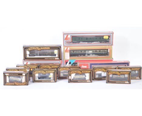 A collection of Lima and Palitoy Mainline OO gauge model railway trainset locomotive rolling stock coaches and wagons. Exampl