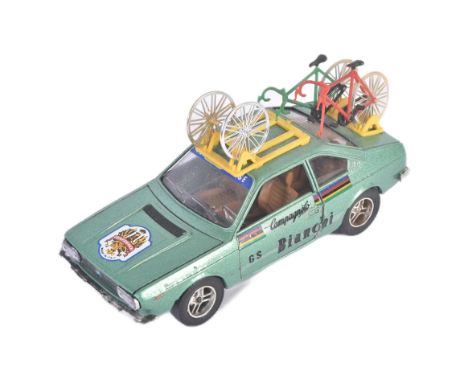 An original vintage Italian Mebetoys / Mattel made 1/25 scale diecast model Lancia-Beta-Coupe car with roof rack and bikes. D