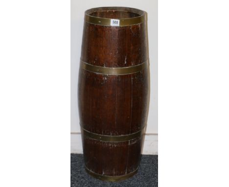 Early 20th Century coppered oak stick stand in the form of a barrel, 68cm tall.