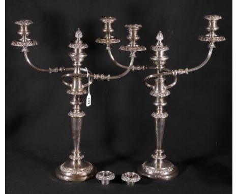 Pair of Old Sheffield two-branch three-light candelabra with foliate bands on inverted tapering circular stems, with finials 