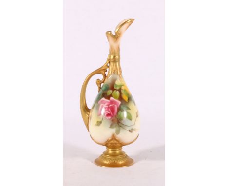 Royal Worcester ewer with hand painted rose decoration, 21cm tall CONDITION REPORT: A few gilding losses. Mark on the inside 