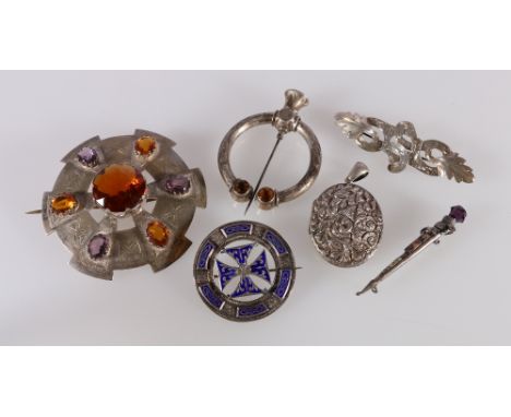 Scottish jewellery including a citrine set penannular brooch, an enamelled Maltese cross brooch, a citrine and amethyst set c