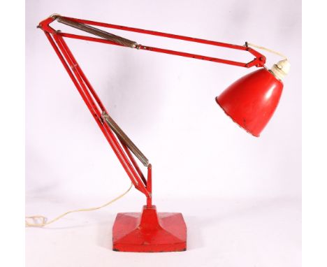 Herbert Terry anglepoise lamp with red body.