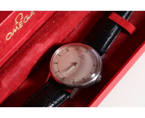 Gents Omega wristwatch with Arabic numeral chapter ring with silvered dial, on leather strap. CONDITION REPORT: Cased the wat