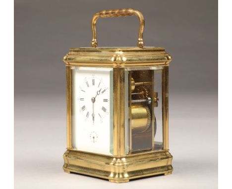 Early 20th Century repeating brass carriage clock, white enamel dial with alarm dial, time piece striking on a gong, with key