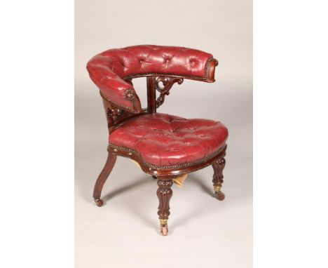 Regency mahogany red leather, button back cock fighting chair, raised on reeded legs Condition reportSome restorations, pleas