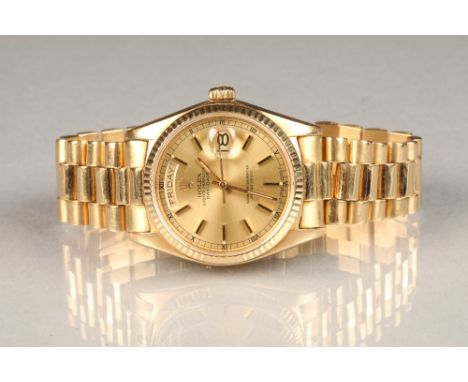 18 carat gold gents Rolex Oyster Perpetual day date, numeric wrist watch, champagne dial with applied baton hour mark date ap