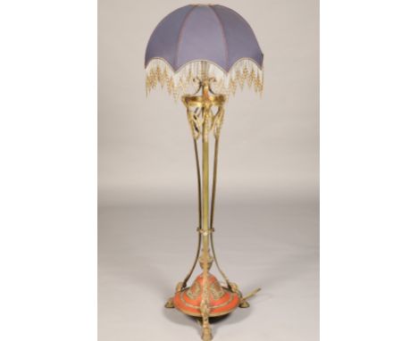 Gilt metal standard lamp, Adam style, with applied rams head and floral garland and raised of hoof feet, height 152cm Conditi