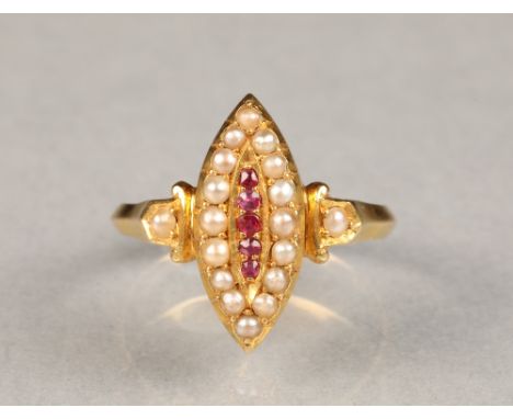 Ladies 18 carat gold ruby and seed pearl ringfive small centre rubies surrounded by sixteen seed pearls in oval setting with 