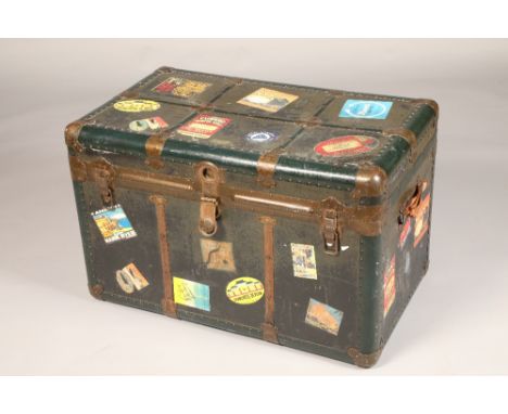 Travel trunk  with various luggage labels, width 58cm, height 57cm