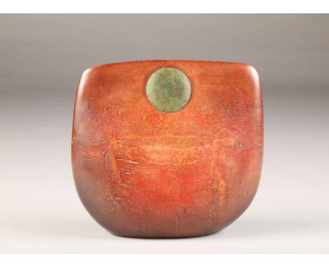 Peter Hayes (British Born 1946) A raku bow with fractured red surface and green disc, incised signature dated 1994, height 23