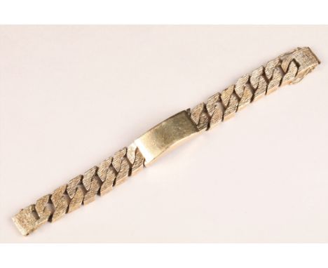 Heavy gents 9 carat gold identity bracelet, length 22cm, width 1.8cm, weight 197.8g CONDITON REPORTThe heavy bracelet is in g