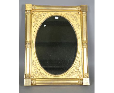 An early Victorian giltwood rectangular wall mirror with foliate mouldings and foliate cusp half pillars, 92cm x 71cm.Buyer’s