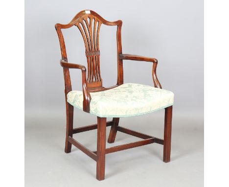 A George III mahogany and green damask upholstered elbow chair, height 100cm, width 60cm.Buyer’s Premium 29.4% (including VAT