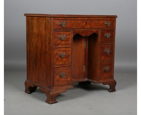 An early 20th century George III style mahogany kneehole desk, height 75cm, width 76cm, depth 46cm.Buyer’s Premium 29.4% (inc