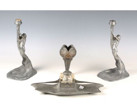 An Art Nouveau pewter inkwell by Orivit, model number '2354', width 33cm, together with a pair of Art Nouveau pewter figural 