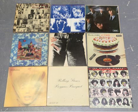 A collection of fifteen LP records by The Rolling Stones, including 'No. 2', 'Beggars Banquet' and 'Sticky Fingers', together