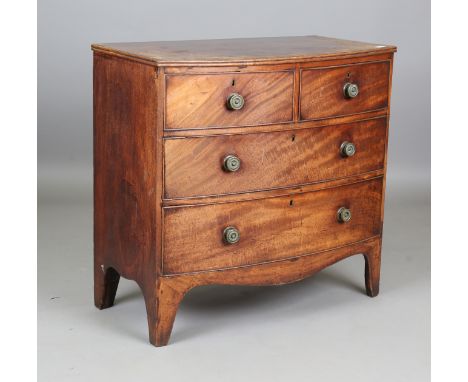 A small Regency mahogany bowfront chest of oak-lined drawers, height 85cm, width 90cm, depth 46cm.Buyer’s Premium 29.4% (incl
