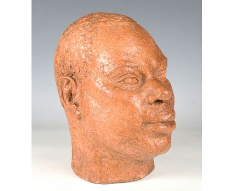 A 20th century terracotta bust portrait of a black man, height 27cm.Buyer’s Premium 29.4% (including VAT @ 20%) of the hammer