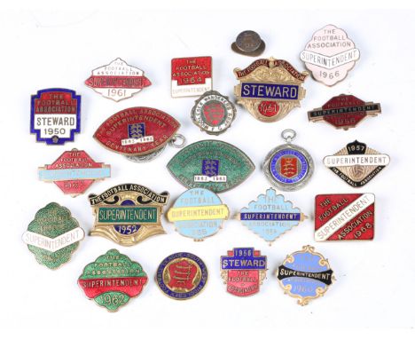 A group of twenty-three mainly mid-20th century enamelled Superintendent and Steward football badges.Buyer’s Premium 29.4% (i