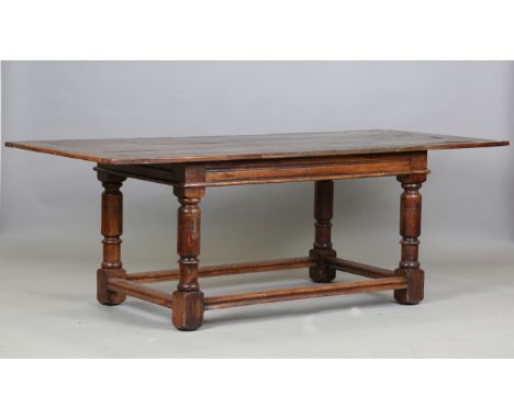 A 17th century style oak refectory table, raised on turned and block legs, height 73cm, length 204cm, depth 93cm.Buyer’s Prem