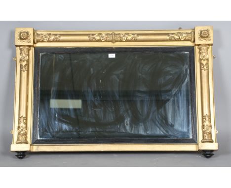 A Regency giltwood and composition overmantel mirror with applied foliate mouldings, 75cm x 115cm (later gilt painted).Buyer’