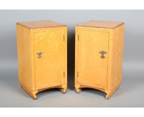 A pair of Art Deco bird's eye maple and walnut crossbanded bedside cabinets, height 69cm, width 36cm, depth 37cm.Buyer’s Prem