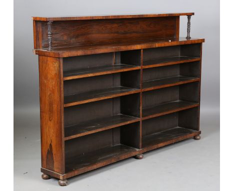 A Regency rosewood open bookcase, the shelf back with acanthus carved supports, height 117cm, width 168cm, depth 30cm (altera