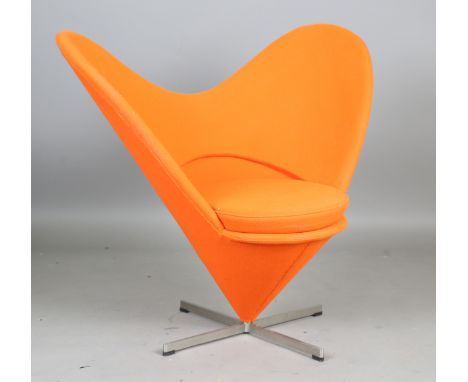 A 20th century 'Heart Cone' chair, designed by Verner Panton, upholstered in orange fabric and raised on steel supports, heig