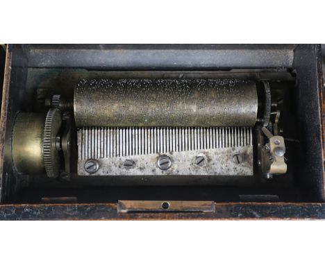 A 19th century Swiss rosewood and marquetry inlaid music box, the lever-wind mechanism playing airs on a 15cm cylinder, width