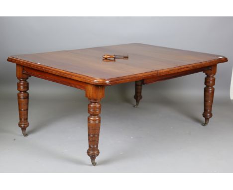 A late Victorian walnut extending dining table, the top fitted with a single extra leaf, height 71cm, extended length 172cm, 