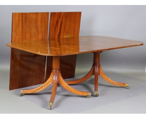 A modern George III style hardwood dining table by William Tillman, fitted with two extra leaves, height 72cm, length 308cm, 