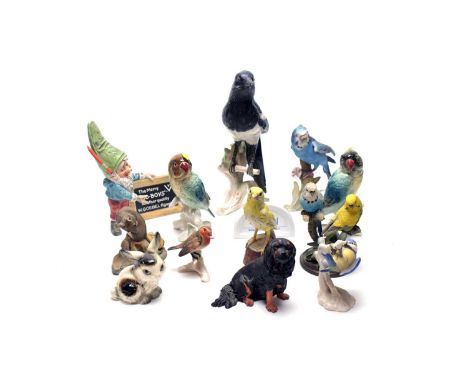 A selection of Goebel ceramic bird figures, including: Magpie figure; Budgie figure; Blue Titmouse; and others; together with