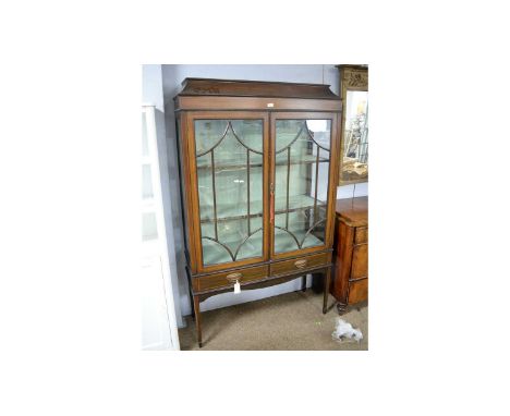 An Edwardian mahogany and satinwood banded china cabinet, with caddy-style top above a pair of glazed astragal doors enclosin