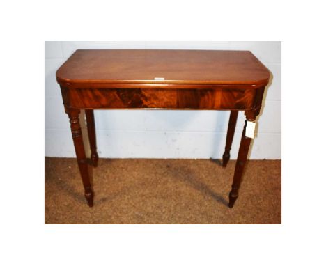 A Victorian mahogany tea table, the rectangular hinged top opening onto gateleg, on ring turned tapering legs, 90 x 43 x 74cm