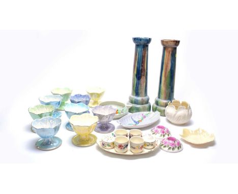 A set of nine Maling lustre sundae dishes, of typical form, in shades including yellow, feeen and blue; together with other c