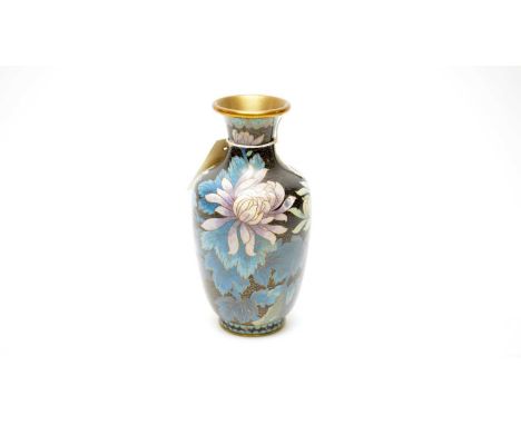 A Chinese cloisonné enamel vase, with floral decoration in shades of purple and blue, on a black ground, 20.5cms high.