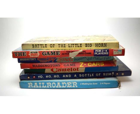 A selection of vintage board games, including: Waddington’s Spy Ring game; Waddington’s Railroader game; Waddington’s Bonanza