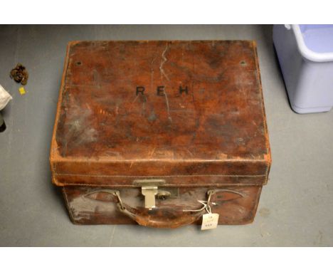 An early 20th Century brown leather travel trunk, case or hat box, of small proportions, with initials in black to hinged lid