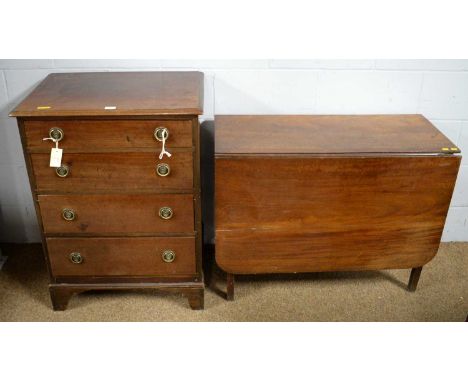 A 19th Century mahogany chest, the rectangular moulded top above four long graduated drawers, each with brass ring handles, b