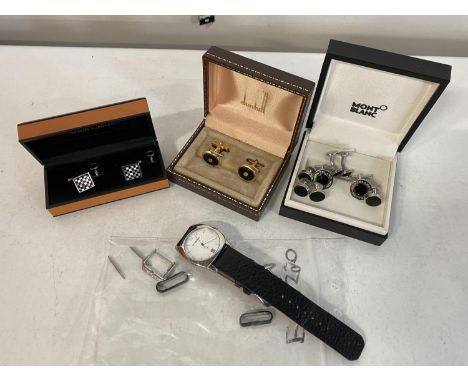 A pair of boxed Mont Blanc Cufflinks, Dunhill cufflinks along with a Fossil watch