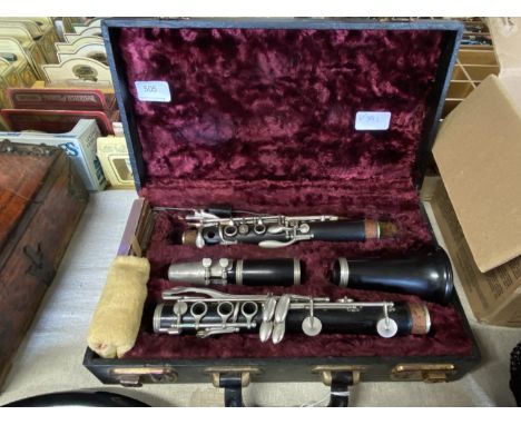 A antique English made clarinet in fitted case 