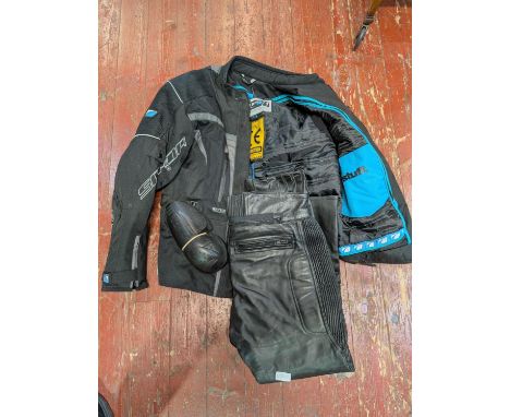 A Metrospada motorbike jacket size L with a pair of Sportex leather motorbike trousers size 32W 