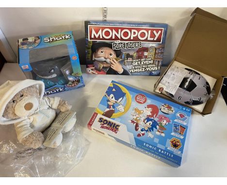 A box of assorted collectible and games etc including Monopoly, shipping unavailable
